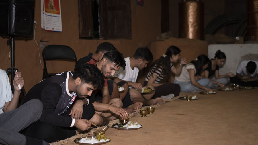 Friends gathered for dinner at the farmhouse